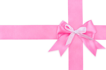 Gift pink ribbon and bow isolated on white background.