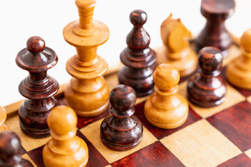 chess pieces of different colors in the same team, theme of unity and respect, detail photography