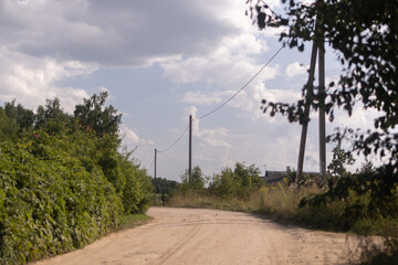 Beautiful rural road in the countryside, day landscape