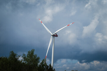 Beautiful cloudy sky with windmill in saarland germany europe