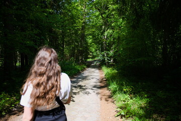 Woman walking in the woods
