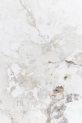 Weathered White Concrete Wall with Cracks 