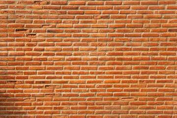 Brown block brick wall background, building wall