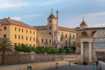 Fototapeta na wymiar San Rafael triumphal monument and Episcopal Palace - Cordoba, Andalusia, Spain