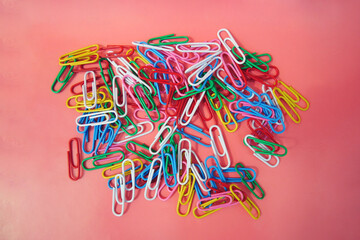 Paperclips on white background, National Paperclip Day illustration.