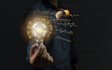 Scientist holding a light bulb and surrounding it with physics or mathematical equations showing ideas for solving problems or developing new things. innovation concept. - obrazy, fototapety, plakaty