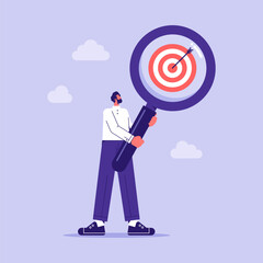 Finding or analyzing business goals and targets concept, businessman with magnifier focuses on the target, focusing