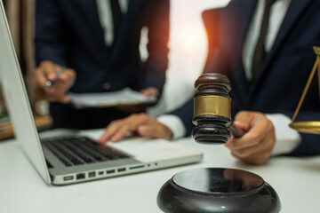 team meeting.businessman discussing legal legislation at law firm. judge gavel 