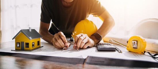 Diverse Team of Specialists Use Tablet Computer on Construction Site. Real Estate Building Project...