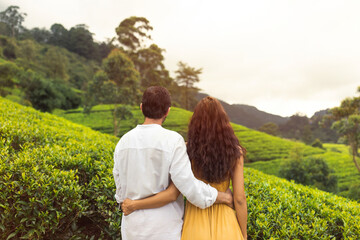 Couple of Tourists in During Excursion to Green Tea Terraces in Sri Lanka Mountains