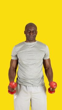 African Man Doing Hammer Curl With Dumbbells