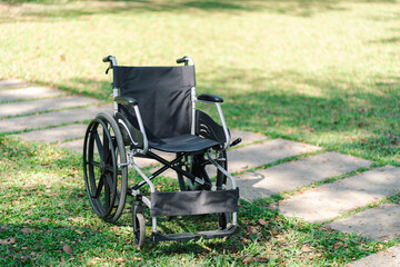 wheelchair in the park  with copy space.