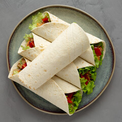 Homemade Avocado Tuna Wraps on a Plate, top view. Flat lay, overhead, from above.