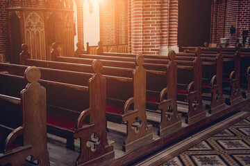 Rows of church benches at the old european catholic church.