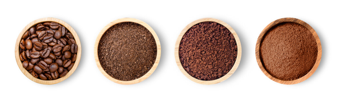 Roasted coffee beans and coffee powder (ground coffe) in wooden bowl isolated on white background. Top view. Flat lay.