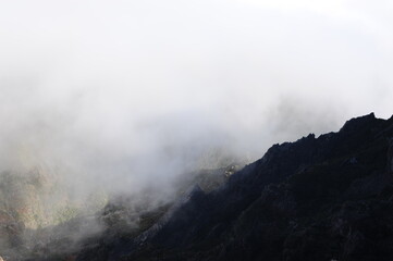 Cloudscape. Mountain range and peaks covered in clouds, fog and mist on Madeira Island , Portugal, Europe