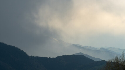 cloudy weather in the mountains. black clouds over mountain peaks. storm