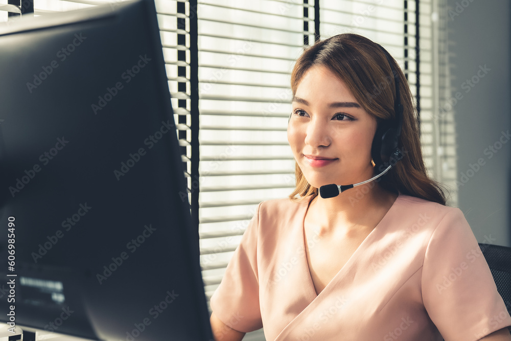 Aufkleber competent female operator working on computer and while talking with clients. concept relevant to bo