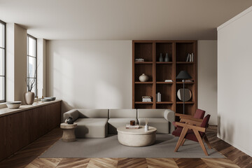 White living room interior with two armchairs, sofa and bookcase