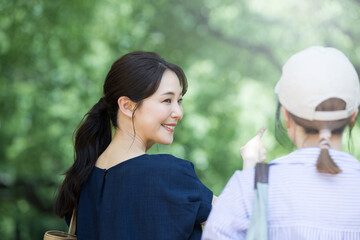 Image of going on a trip with friends to a summer resort with beautiful greenery