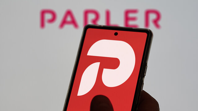May 28th 2023. A screen with Parler's emblem on the first plan, the logo of Parler on the background. 