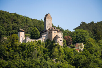 Fototapeta na wymiar 12th-century fairytale castle on a hill in the Altmühl valley in Bavaria, Germany (Kipfenberg)