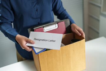 Business people giving a resign letter to quit a job at office..