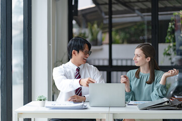 Fototapeta premium Business startup team working together, Diverse people brainstorming in workplace..