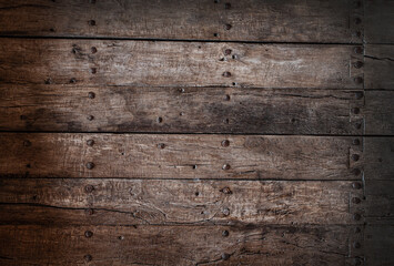 Fototapeta premium Old cracked paint on wooden planks. Selective focus