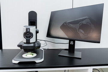 Optic machine for precise measurement of part size and quality evaluation. Smart factory.	