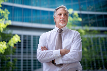 Outdoor portrait of a confident senior executive