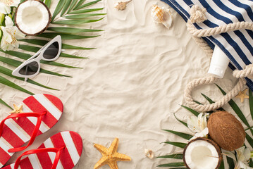 Fototapeta na wymiar Transport yourself to sunny realm of summer relaxation with top view scene: glasses, beach bag, flip-flops, sunscreen, shell, starfish, palm leaves, coconut, flowers. Sandy shore, space for text or ad