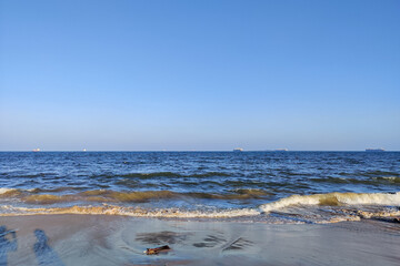 Tropical beach and blue sky landscape. View of beautiful sea on a sunny day.