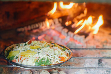 Vegetarian Pizza Tray In the oven with fire, food and lifestyle of the vegan.