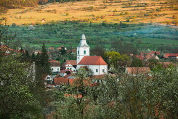 Rimetea is a small village located in Transylvania, Romania. It is situated in the Apuseni Mountains and is known for its picturesque setting and well preserved Hungarian architectural style.