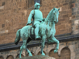Bremen, Germany. Bismarck monument close to Bremen Cathedral. The equestrian statue of the German Chancellor Otto von Bismarck was erected in 1910. - obrazy, fototapety, plakaty