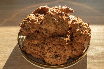 Oatmeal Cookies with raisins on a platter close-up.