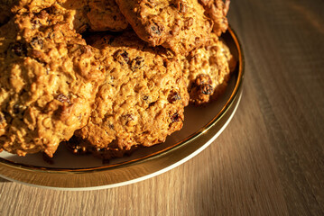 Oatmeal Cookies with raisins on a platter close-up.
