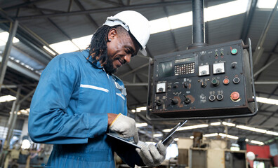 Fototapeta na wymiar African engineer at factory