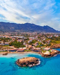 Fotobehang Escape Beach in Kyrenia, North Cyprus on sunny day with clear sky © Alp Galip