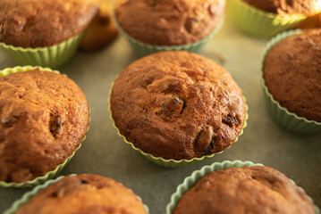 Homemade muffins on a tray in silicone molds.