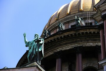 Isaac Cathedral dome with small statues in Sankt, Petersburg Russia © Salty|snow Photography/Wirestock Creators