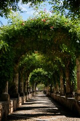 Vertical shot of a way with arch trees ceiling of Jardines de Alfabia in Mallorca, Spain
