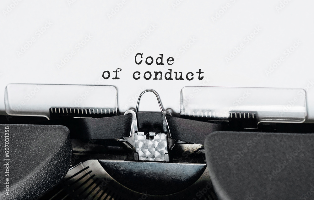 Poster text code of conduct typed on retro typewriter