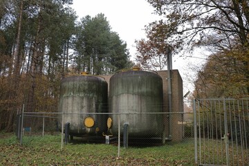 Obraz premium Massive water tanks in a forest in Waterloopbos, Marknesse, the Netherlands