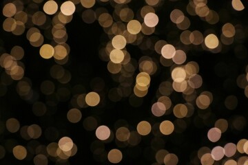 Background of bokeh lights, a blurred view of glittery yellow lights