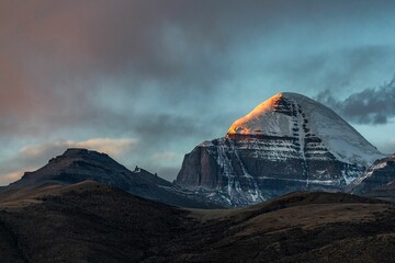Beautiful shot of sunset with Mount Kailash in Taqin County, Ali Prefecture, Tibet, China © Kazushi/Wirestock Creators