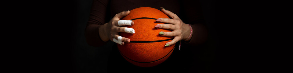 Banner 4x1 Concept Women's sport. Hands hold the ball. One hand in tapes. Second hand with manicure