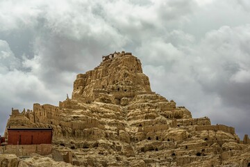 Ruins of the historic Guge Kingdom with destroyed walls and architecture in Zada Country, Tibet
