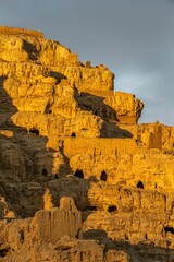 Vertical shot of the ruins of the Guge Dynasty in Zada County at sunrise